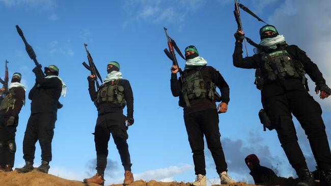 Palestinian militant group Hamas fighters. They are child murderers, rapists and cowards who hide behind civilians and hospitals. Picture: Eyad Baba/AFP