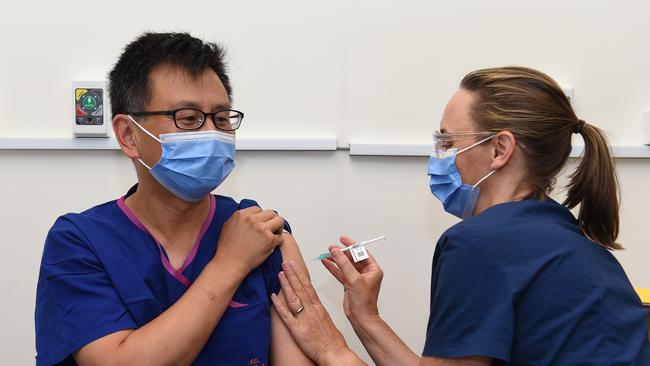 Prof Allan Cheng receives the vaccine. Picture: Josie Hayden