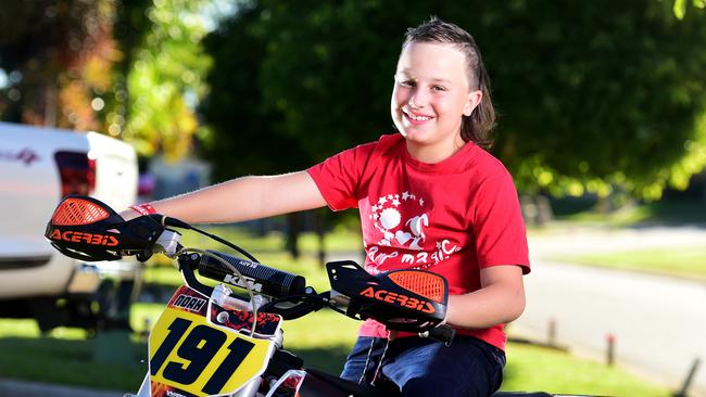 Noah Schulte 10, speaks about attending Camp Magic, to help him deal with trauma. Picture: Alix Sweeney