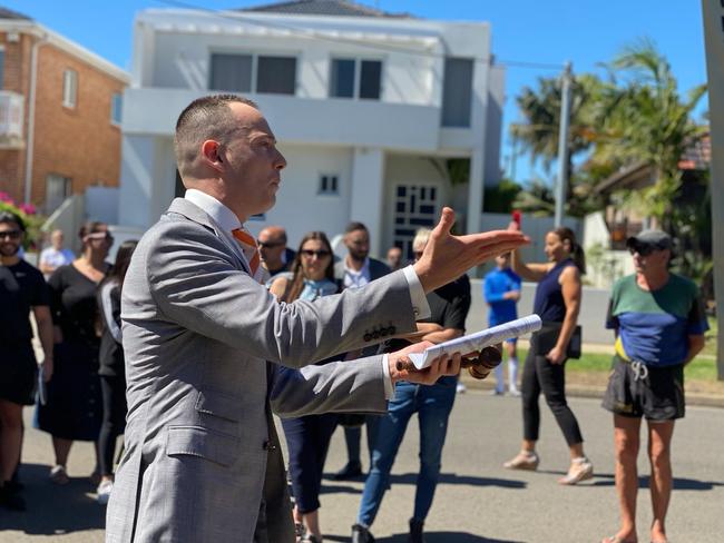 Auctioneer Andrew Cooley at a Kyeemah property that sold for $440,000 over reserve. NSW real estate.