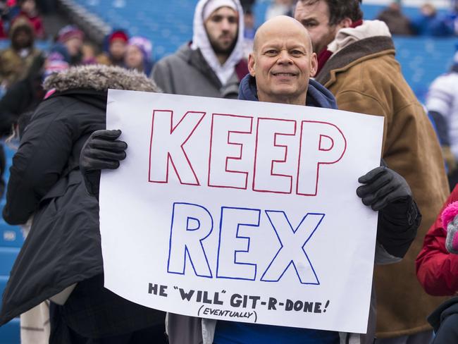 A Buffalo Bills fan holds a sign supporting head coach Rex Ryan before the game against the Miami Dolphins on December 24.