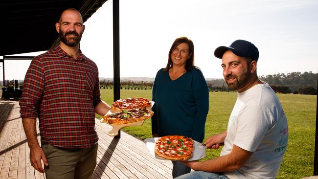 Pizzateca’s pizza chef Ettore Bertonati with Annarita and Tony Mitolo (left). Picture: Matt Turner