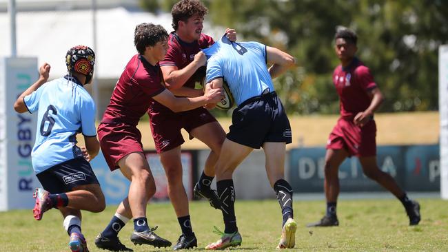 Queensland and NSW fighting it out at Forshaw Park. Pics: Jeremy Ng