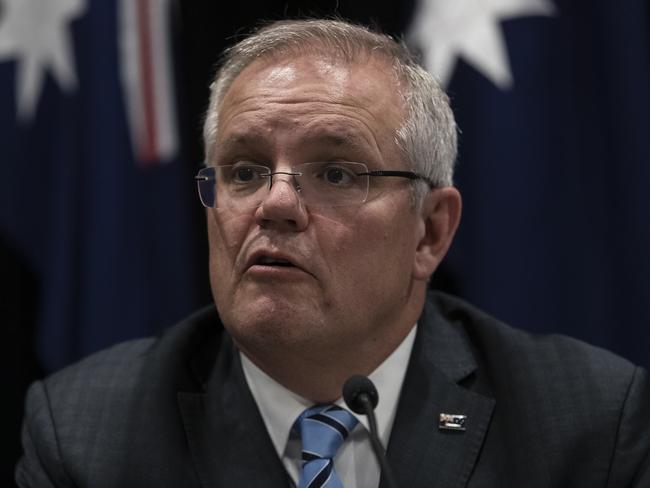 SYDNEY, AUSTRALIA - MARCH 13: Prime Minister Scott Morrison speaks during a press conference announcing the recommendation that all mass gatherings of 500 people or more are cancelled from Monday 16th of March. The government is also recommending against all overseas travel. The press conference followed the Council of Australian Governments (COAG) meeting on 13th of March, 2020 in Sydney, Australia. The usual agenda for the state, territory and local government leaders has been set aside to discuss measures to stop further spreading of COVID-19 in Australia. (Photo by Brook Mitchell/Getty Images)