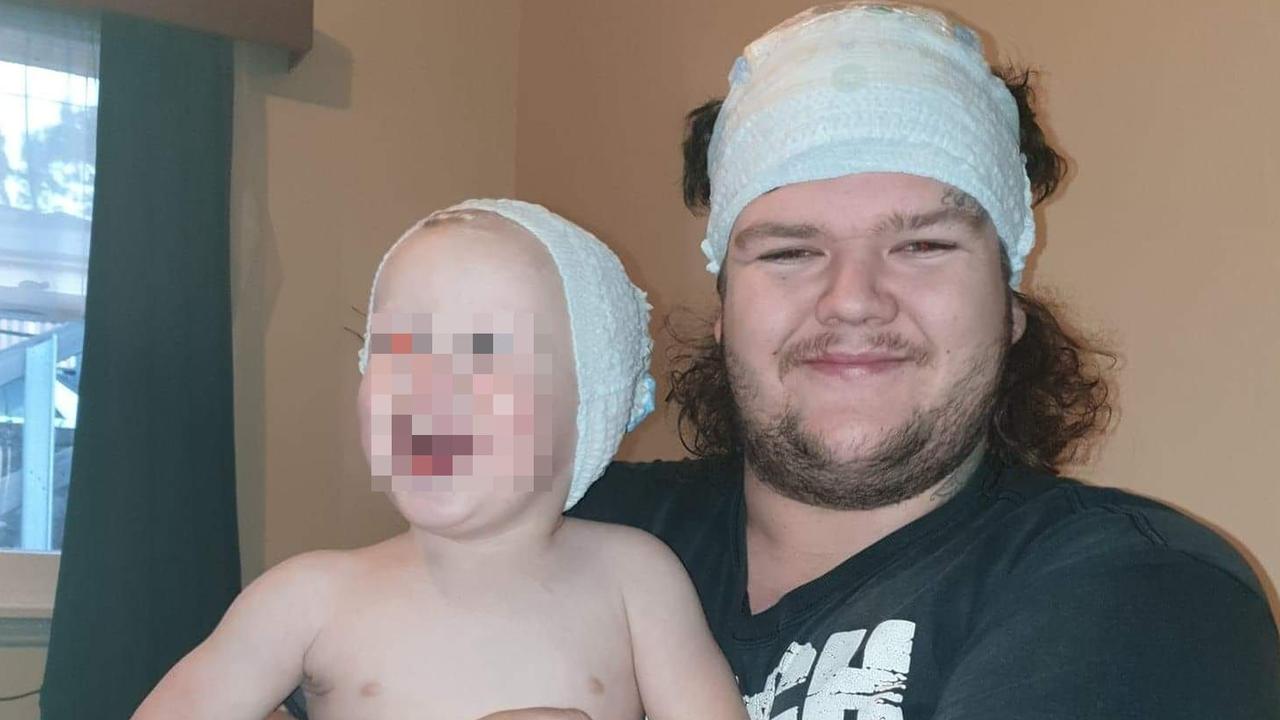 Alleged Burnie murder victim Bobby William Medcraft, 23, pictured with his young son. Picture: Facebook