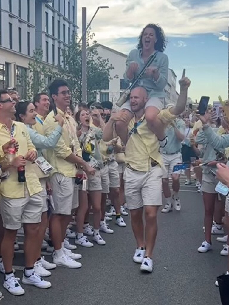 Rachel ‘Raygun’ Gunn atop the shoulders of Angus Widdicombe. Australian Olympians celebrated the 2024 Paris Games with singing, dancing, and displays of mateship. Picture: Instagram