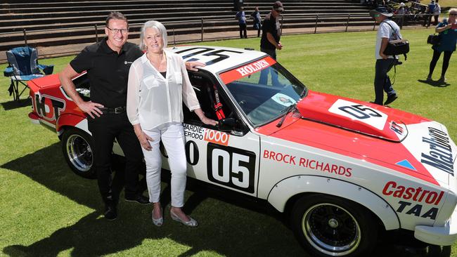 Mark Skaife and Bev Brock, with a Peter Brock tribute car at the Holden Dream Cruise, which was held to make the carmaker’s last week in Adelaide. Picture: Dylan Coker