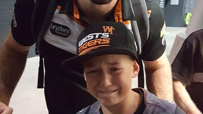 James Tedesco with young fan Ashton.