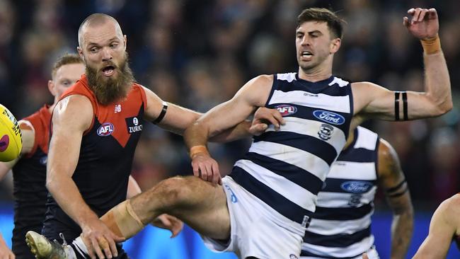 Max Gawn battles Ryan Abbott.