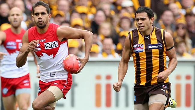 Lewis Jetta gets away from Cyril Rioli in the 2012 Grand Final.