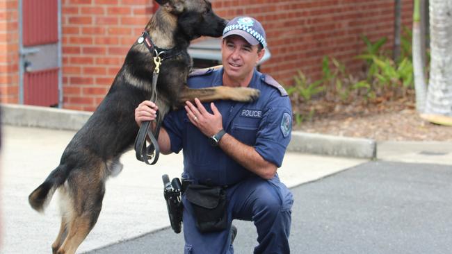 Yogi the Belgian Shepherd with trainer, senior constable David Kotek.