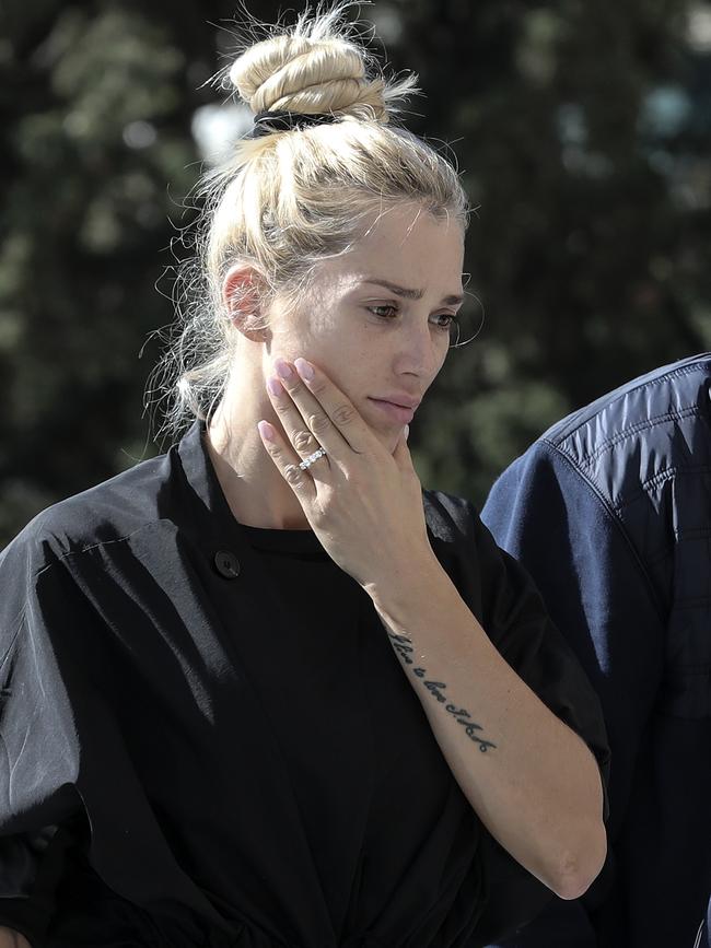 He leaves behind his former Playboy model and TV presenter wife Viktoria Karida and their two kids. Picture: AP Photo/Yorgos Karahalis