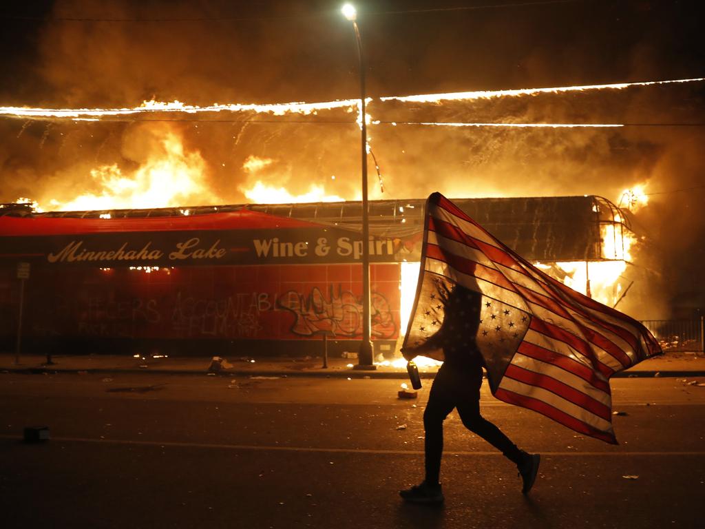 Protests against Floyd's death have set off days and nights of rage across the United States. Picture: Julio Cortez/AP