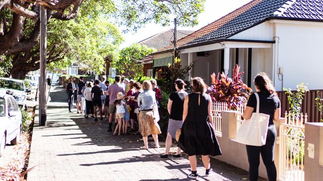 House hunters line up for an open home inspection.