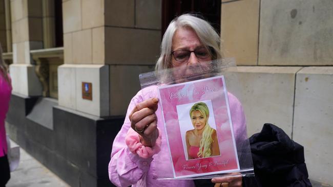 Sherry Bradford, the grandmother of Ellie Price, holds a photo outside the Supreme Court of Victoria. Picture: NewsWire / Luis Enrique Ascui