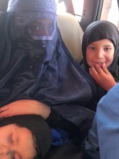 The orphan girls were dressed in burqas and hijabs for the journey from Kabul to Islamabad. Picture: Supplied