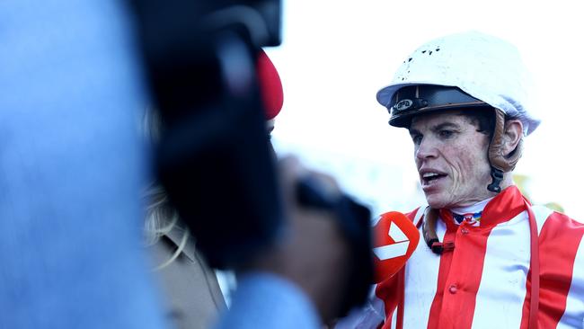 Craig Williams talks to media after winning the All Aged Stakes on Giga Kick. Picture: Jeremy Ng–Getty Images