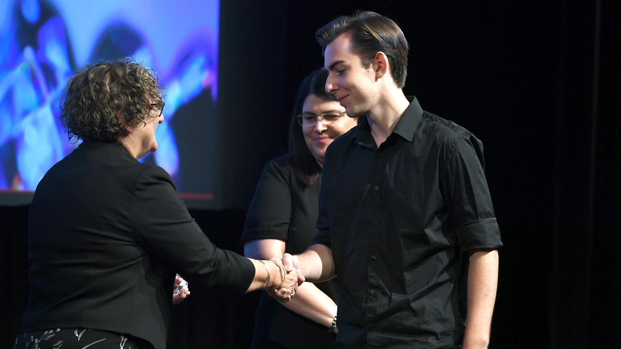 Alec Walsh receiving an award at the QCE Awards presentation. Picture: AAP/John Gass