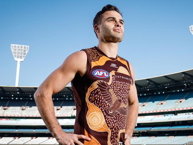 MELBOURNE, AUSTRALIA - MAY 13: Karl Amon of the Hawks poses for a photo during a Sir Doug Nicholls Round media opportunity at Melbourne Cricket Ground on May 13, 2024 in Melbourne, Australia. (Photo by Dylan Burns/AFL Photos via Getty Images)