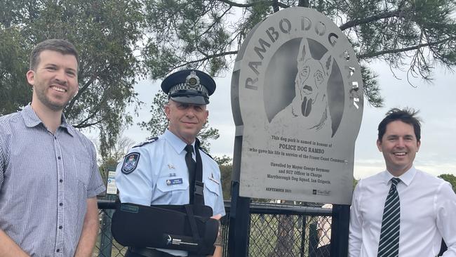 Councillor Paul Truscott with Sergeant Ian Grigoris and Mayor George Seymour at the dog park named in honour of fallen police dog, Rambo.