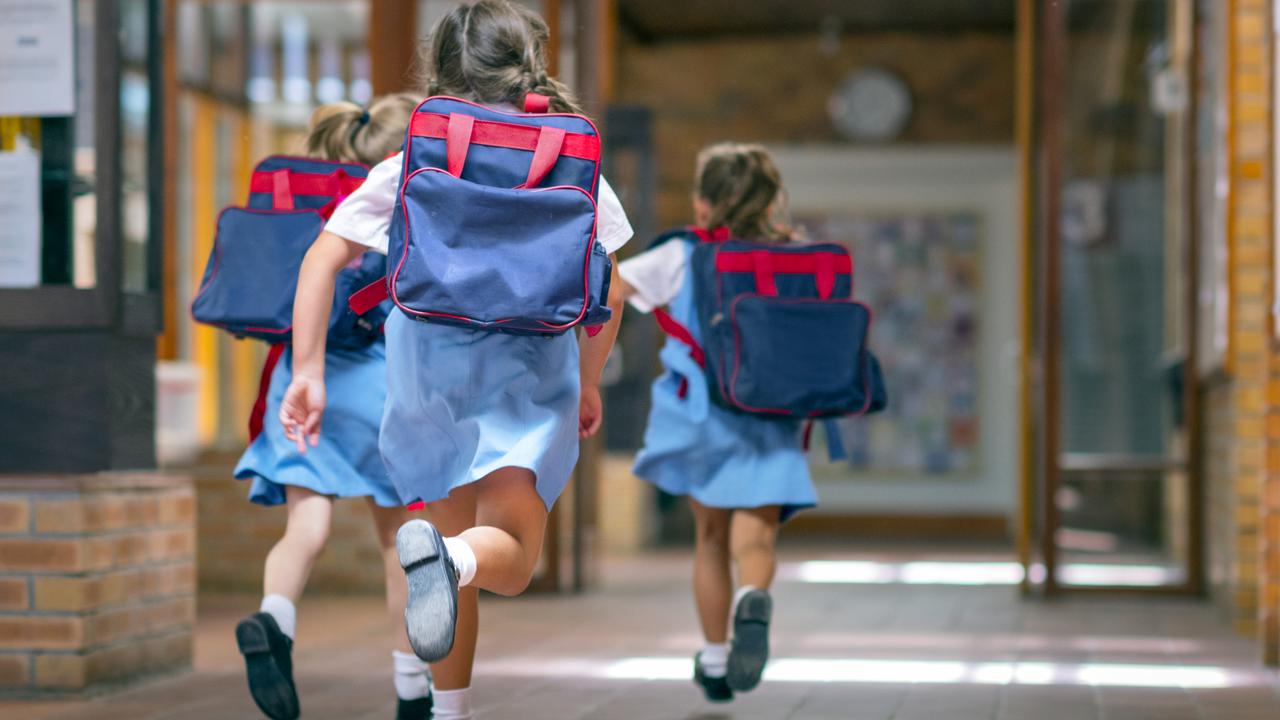 Carrying books, not virus at school | Daily Telegraph