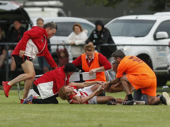 Sorrento’s Mitch Dunn clutches his knee. Picture: Valeriu Campan