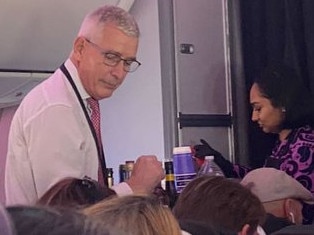 Greg Foran - Air New Zealand CEO serves drinks on flight. Picture: NZ Herald