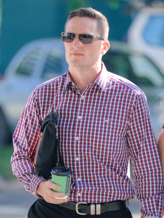 NT Police Officer Patrick Carson allegedly raped a teenage woman arriving at the NT Supreme Court with supporters. Picture: Glenn Campbell