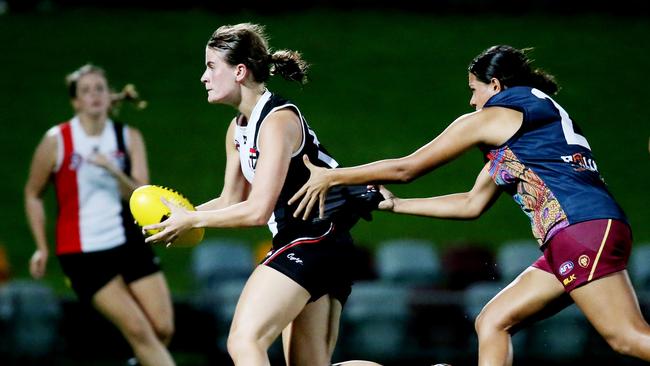 Cairns AFL pre-season matches at Cazalys. Cairns City Lions v Cairns Saints. Saints' Greta Bodey and Lions' Laquoiya Matlop. PICTURE: STEWART MCLEAN