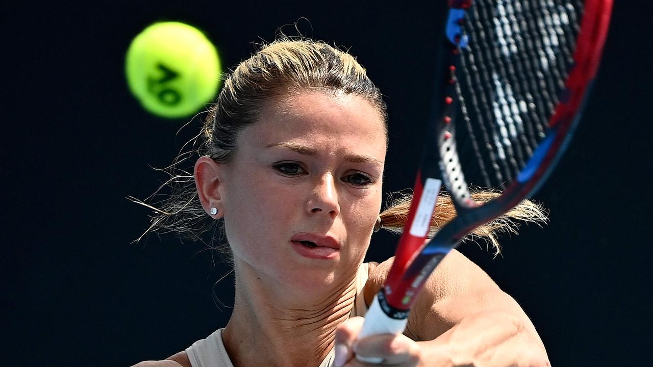 Giorgi may have been more comfortable in the heat than in the press conference. Photo by MANAN VATSYAYANA / AFP