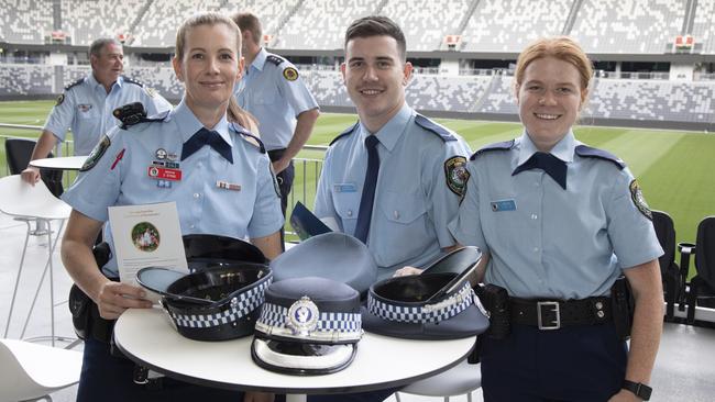 Police take some time off from the beat at the Christmas party.