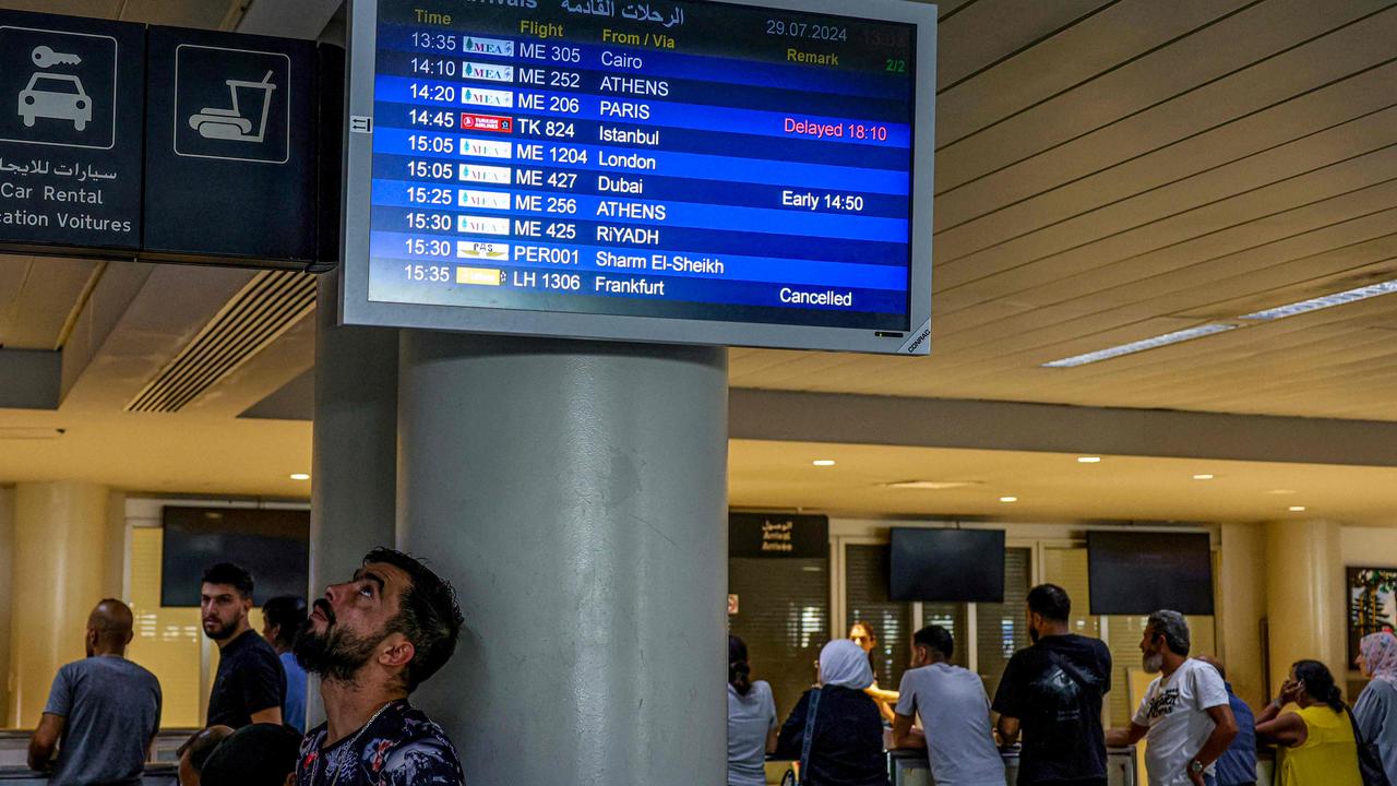 A man looks up by the arrivals board at Rafic Hariri International Airport in Beirut. Pictiure: Anwar Amro / AFP