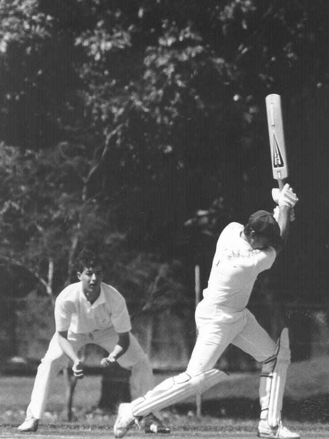 Palmerston batsman Doug Kerr and Waratahs catcher Anthony Dent mid-action during a cricket match held at Kahlin Oval. Circa: 7/1993.