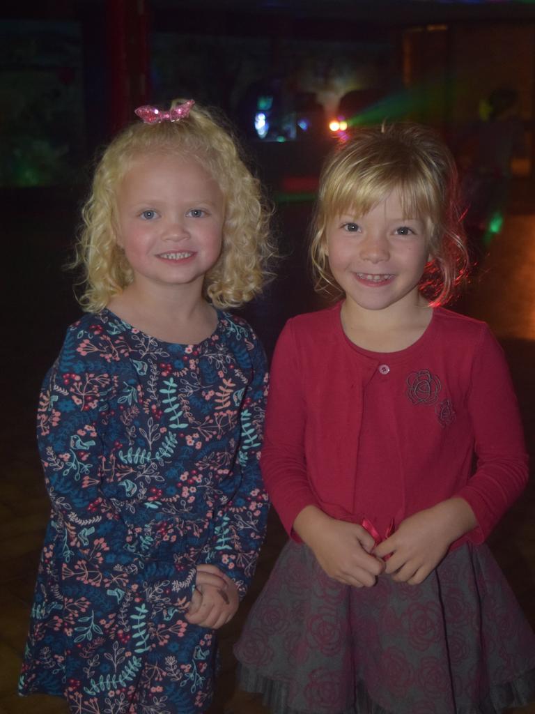 DANCING TIME: Emily Linton and Lacey Anderson enjoy the Blue Light Disco on Friday night. Photo: Alex Nolan / Stanthorpe Border Post