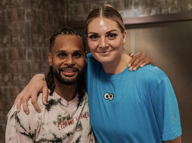 Boomers and Brooklyn Nets guard Patty Mills spoke to the Opals squad, including centre Cayla George. Picture: Basketball Australia.