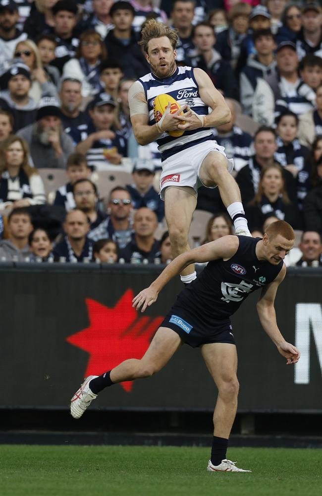 Cameron Guthrie pulls down a hanger. Picture: Michael Klein