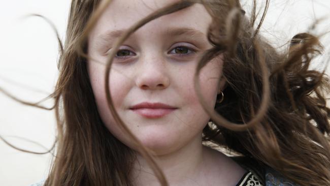 Young Viking Maiden Gabrielle Metcalfe, 9, poses for a photo at Hawkesbury Showground Winterfest Medieval Festival on Saturday, July 7, 2018. The festival drew a large crowd from the Hawkesbury area who came for the food, folk music and fun. (AAP Image/David Swift)