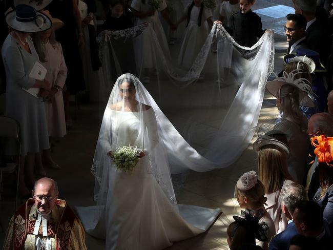 She then walked down the aisle by herself. Picture: Danny Lawson/AFP