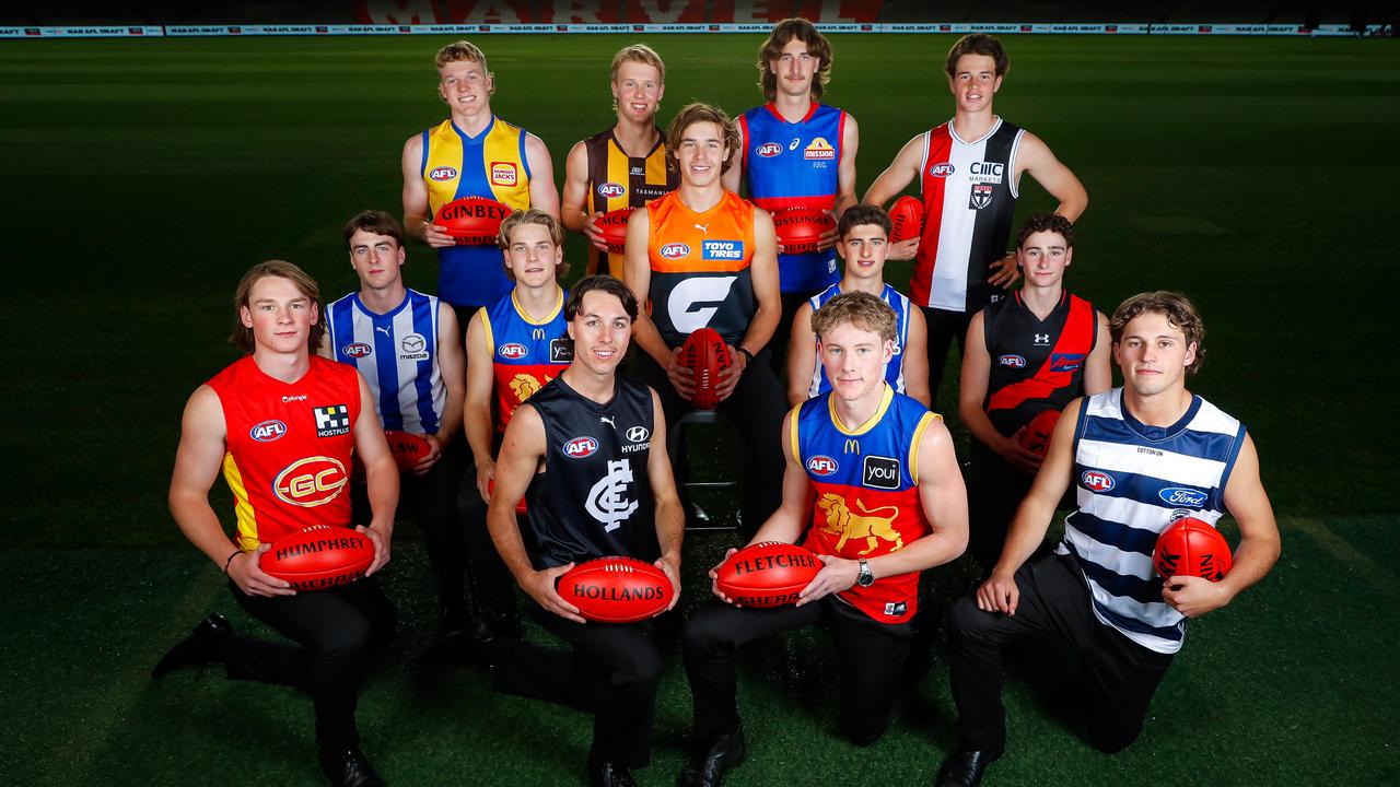 The top 10: Bailey Humphrey of the Suns, Oliver Hollands of the Blues, Jaspa Fletcher of the Lions, Jhye Clark of the Cats, (Middle Row L-R) George Wardlaw of the Kangaroos, Will Ashcroft of the Lions, Aaron Cadman of the Giants, Harry Sheezel of the Kangaroos, Elijah Tsatas of the Bombers, (Back Row L-R) Reuben Ginbey of the Eagles, Cameron Mackenzie of the Hawks, Jedd Busslinger of the Bulldogs and Mattaes Phillipou of the Saints. Picture: Dylan Burns