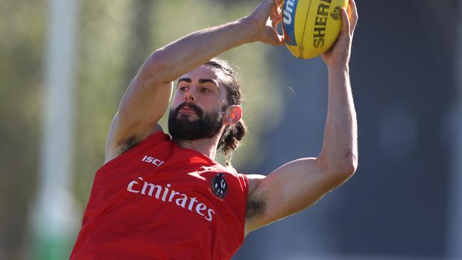 Brodie Grundy almost missed the Queen’s Birthday clash with Melbourne due to a beck injury. Picture: AAP Image/David Crosling.