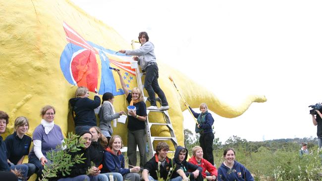 World Youth Day pilgrims paint their WYD logo on Ploddy. Picture: Supplied