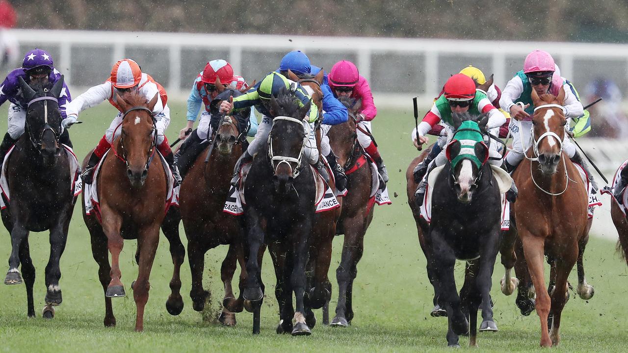 The Caulfield Cup is run over 2400 mtrs. Mer De Glace ridden by Damian Lane (red cap) on his way to winning last year’s race.