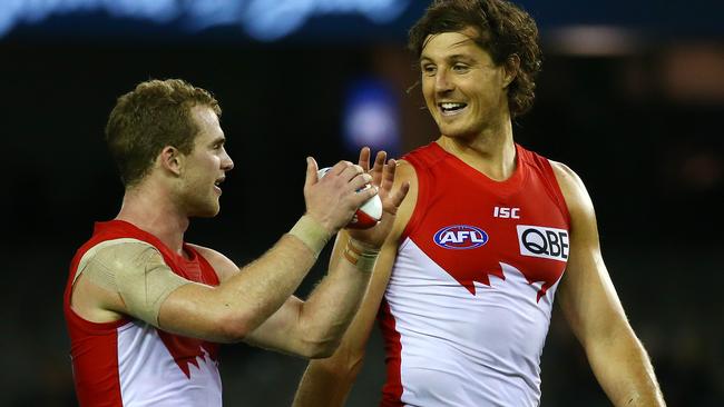 AFL: Round 2 Carlton V Sydney Swans at Etihad , 3rd of April , Melbourne Australia. Sydney's Tom Mitchell and Kurt Tippett Picture : George Salpigtidis