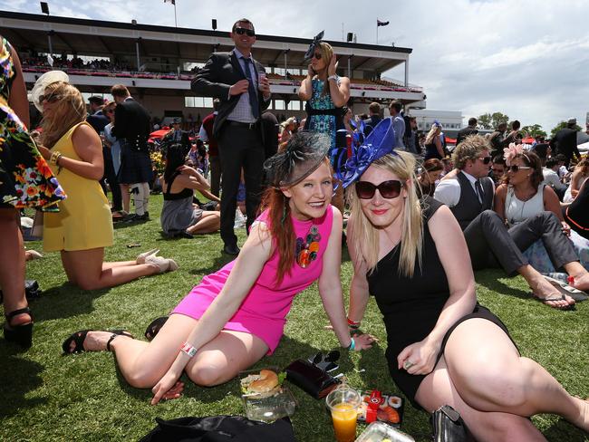 Melbourne Cup Day 2014 at Flemington Racecourse. Race fans enjoy the atmosphere on the lawn. Picture: Mark Stewart