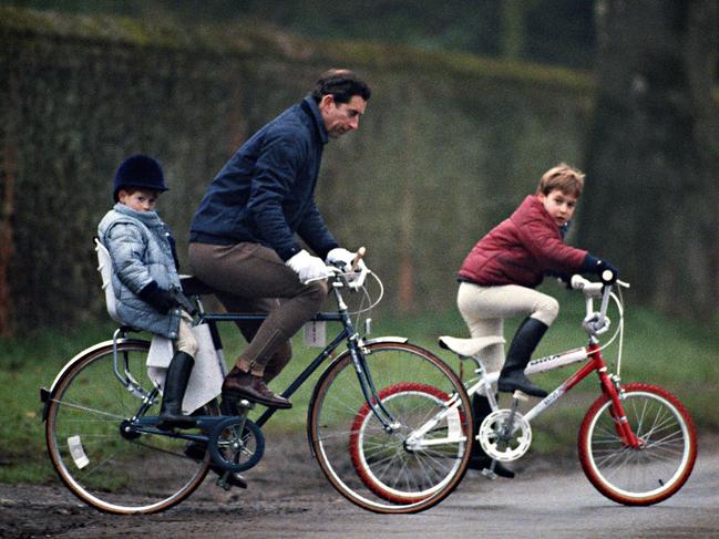 Prince Charles, Prince William and Prince Harry (left) on bikes going to The Stables, at Sandringham Estate, In Norfolk. Picture: Getty Images