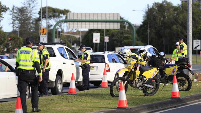 Queensland Police set up a road block due to the coronavirus at the NSW / Queensland border on the old Pacific Highway at Coolangatta. Photo: Scott Powick. Picture: Scott Powick