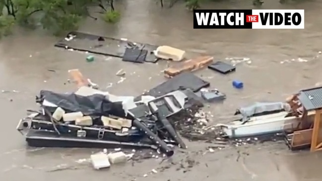 Holman St ferry terminal destroyed by floating debris on the Brisbane River (7 News)