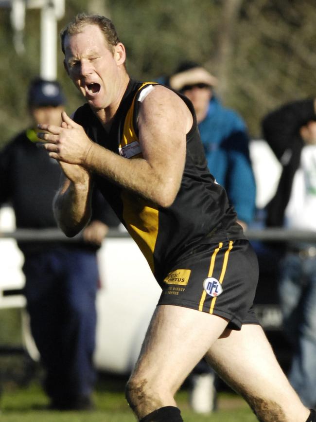 Chris Hall celebrates a goal for Heidelberg.