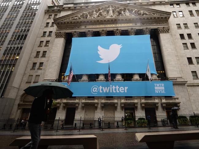 (FILES) This file photo taken on November 7, 2013 shows a banner with the logo of Twitter on the front of the New York Stock Exchange (NYSE) in New York. Major internet services including Twitter and Spotify suffered outages on October 21, 2016 as a US internet provider said it had come under attack.The internet service company Dyn said on its website that it had suffered a denial of service attack shortly after 1100 GMT. / AFP PHOTO / EMMANUEL DUNAND