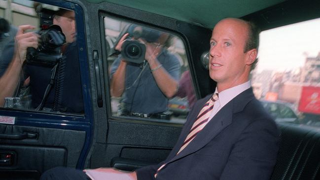 John Bryan, friend and financial advisor to the Duchess of York, is surrounded by the media as he leaves his Solicitors office in London. Picture: Rebecca Naden/Getty Images